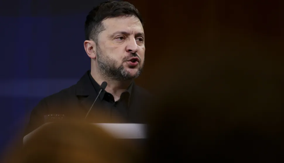 epa12594388 Ukrainian President Volodymyr Zelensky speaks during the 8th German-Ukrainian Economic Forum at the House of German Economy in Berlin, Germany, 15 December 2025. Berlin hosts US and Ukrainian delegations for talks on a proposed peace plan, including a possible ceasefire in Ukraine. EPA/HANNIBAL HANSCHKE