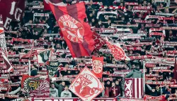 epa12575326 Fans of RB Leipzig cheer during the German Bundesliga soccer match between RB Leipzig vs Eintracht Frankfurt in Leipzig, Germany, 06 December 2025. EPA/Filip Singer