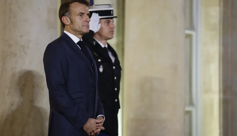 epa12579057 French President Emmanuel Macron (L) awaits the arrival of Croatian Prime Minister Andrej Plenkovic (not pictured) at the Elysee Palace in Paris, France, 08 December 2025. EPA/YOAN VALAT