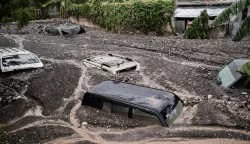 AFP PICTURES OF THE YEAR 2025Cars are submerged in mud following Hurricane Melissa in Petit-Goave, 68km southwest of Port-au-Prince, on October 30, 2025.. Hurricane Melissa was moving towards Bermuda on Thursday after ripping a path of destruction through the Caribbean that left at least 20 people dead in Haiti, and parts of Jamaica and Cuba in ruins. (Photo by Clarens SIFFROY/AFP)/AFP PICTURES OF THE YEAR 2025