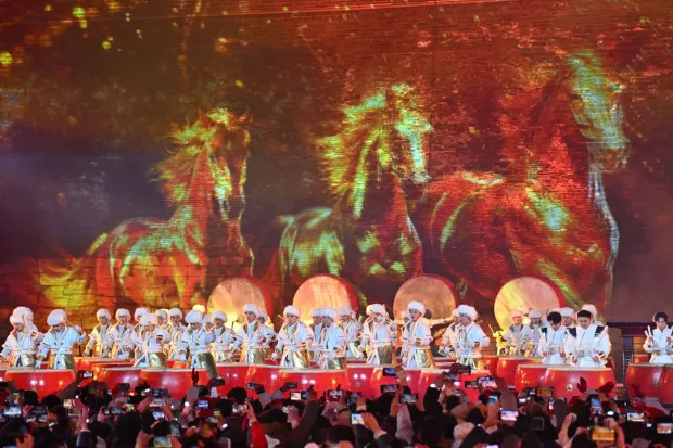 People celebrate the New Year 2026 at the Juyongguan Great Wall, Beijing, on January 1, 2026. (Photo by ADEK BERRY/AFP)