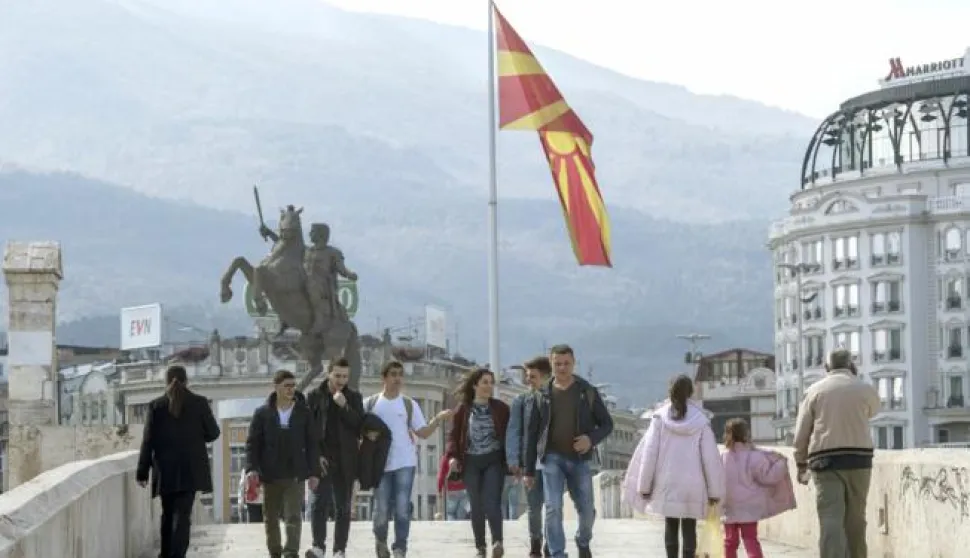 epa05832773 People walk on the old Stone Bridge in Skopje, The Former Yugoslav Republic of Macedonia, 06 March 2017. The Ministers of Foreign Affairs of the European Union member countries will hold a meeting to discuss the situation in the western Balkan countries. The political situation in Macedonia is at an impasse due to the President Gjorge Ivanov's opposition to a coalition of Social Democrat and ethnic Albanian political parties forming a government. EPA/GEORGI LICOVSKI