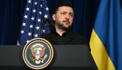 Ukranian President Volodymyr Zelensky speaks during a press conference with US President Donald Trump following talks at Trump's Mar-a-Lago residence in Palm Beach, Florida, on December 28, 2025. (Photo by Jim WATSON/AFP)