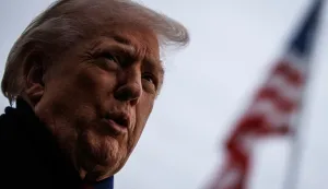 epa12590322 US President Donald Trump speaks with reporters before departing from the South Lawn of the White House in Marine One in Washington, DC, USA, 13 December 2025. The President is heading to Baltimore, Maryland, where he will be attending the Army - Navy football game at M&T Bank Stadium. EPA/Samuel Corum/POOL
