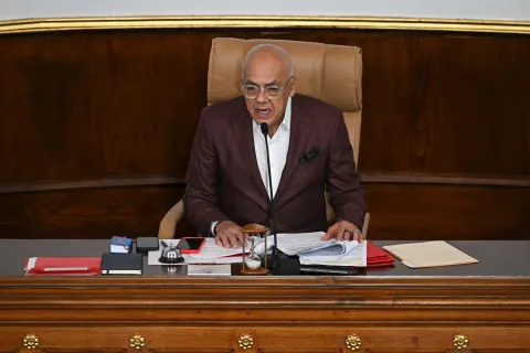 Venezuela's National Assembly President Jorge Rodriguez speaks during an extraordinary session at the National Assembly in Caracas on December 23, 2025. Venezuela's parliament passed a law on December 23 imposing lengthy prison terms on any national who supports a United States oil tanker blockade that Caracas has called piracy. (Photo by Federico PARRA/AFP)