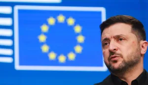 epa12600736 Ukrainian President Volodymyr Zelensky gives a press conference during the EU Council Summit in Brussels, Belgium, 18 December 2025. EU leaders are meeting to discuss the latest developments in Ukraine, the EU's next multiannual financial framework, the EU enlargement process, and the geoeconomic situation in the European Union. EPA/OLIVIER HOSLET