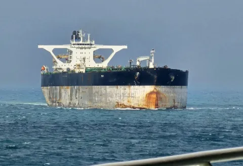 Oil tanker Marinera, foremrly known as Bella 1 photographerd at sea in the Singapore Strait on March 18, 2025. The United States military on January 7, 2026, announced the seizure of a Russian-flagged oil tanker in the North Atlantic for sanctions violations, bringing an end to a multi-week pursuit by American forces. The seizure of the ship, which evaded being boarded near Venezuela, was a joint operation between the Department of Homeland Security and US military personnel, the US European Command, which is responsible for the region, said in a post on X. (Photo by Hakon Rimmereid/AFP)