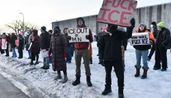 EDITORS NOTE: Graphic content/Protestors gather outside the Bishop Henry Whipple Federal Building in Saint Paul, Minnesota, on January 8, 2026. A US Immigration and Customs Enforcement (ICE) agent shot and killed an American woman on the streets of Minneapolis January 7, leading to huge protests and outrage from local leaders who rejected White House claims she was a domestic terrorist. The woman, identified in local media as 37-year-old Renee Nicole Good, was hit at point blank range as she apparently tried to drive away from agents who were crowding around her car, which they said was blocking their way. (Photo by Octavio JONES/AFP)