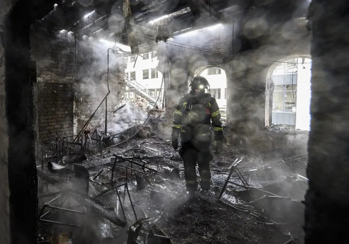 epa12472407 Ukrainian rescuers work at the site of a Russian strike on a kindergarten in Kharkiv, northeastern Ukraine, 22 October 2025, amid the Russian invasion. At least one person was killed and six others injured after Russian strikes hit a kindergarten in Kharkiv, according to the head of the Kharkiv Military Administration, Oleg Synegubov. The 48 children and teachers were safely evacuated to a shelter in the same building. Across Ukraine, the attacks killed at least seven people, including two children, with regions including Kyiv, Odesa, Chernihiv, Dnipropetrovsk, Kirovohrad, Poltava, Vinnytsia, Zaporizhia, Cherkasy, and Sumy affected, according to President Zelensky. EPA/SERGEY KOZLOV