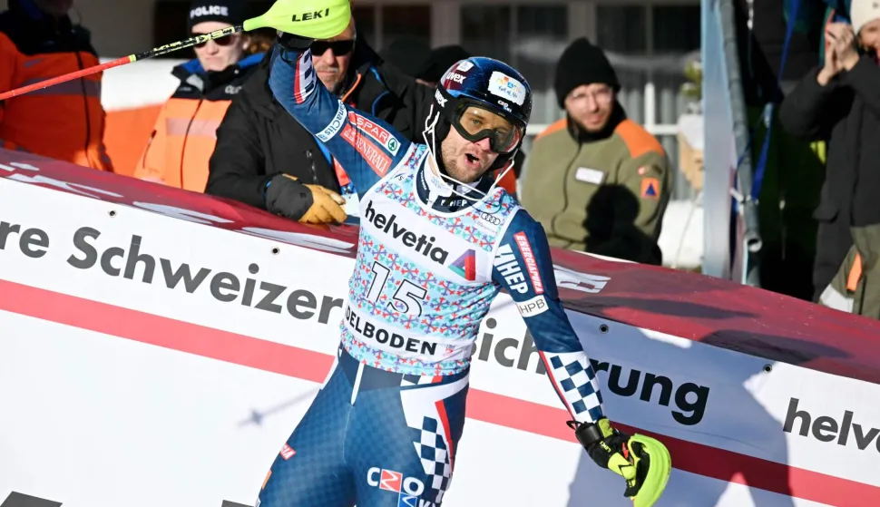 Croatia?s Samuel Kolega reacts after crossing the finish line during the second run of the Men's Slalom, part of the FIS Alpine Ski World Cup 2025-2026 in Adelboden, soutwestern Switzerland on January 11, 2026. (Photo by Fabrice COFFRINI/AFP)