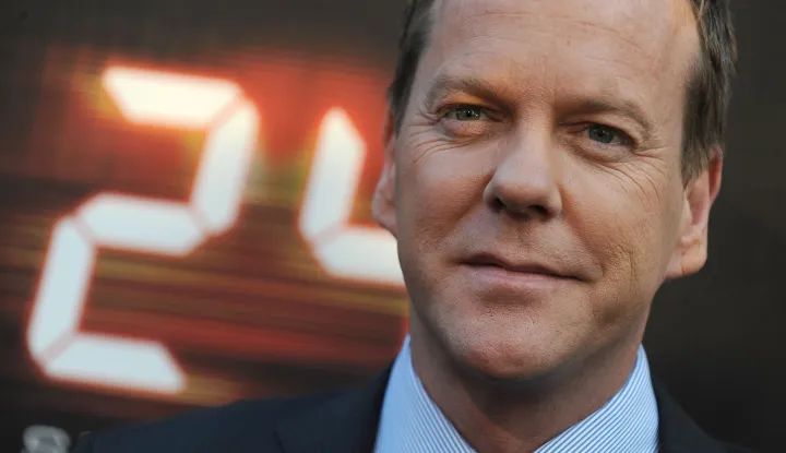 (FILES) Cast member Kiefer Sutherland arrives for the ?24? season seven red carpet screening event on May 12, 2009 at the Wadsworth Theater in Los Angeles, California. Kiefer Sutherland, star of the series "24," was arrested on January 12 in Los Angeles for assaulting a ride-share driver, the city's police announced January 13. (Photo by Robyn BECK/AFP)