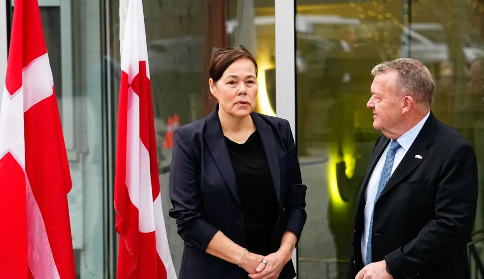Greenland's Foreign Minister Vivian Motzfeldt and Denmark's Foreign Minister Lars Loekke Rasmussen pose at Denmark's embassy in Washington D.C. on January 14, 2026 where they prepare for a meeting with the US Vice-President and the US Foreign Minister later in the day. Denmark will beef up its military presence in Greenland "from today", the defence ministry said January 14, 2026, just before high-stakes talks were to start in Washington over the US President's threats to take over the Arctic island. (Photo by Mads Claus Rasmussen/Ritzau Scanpix/AFP)/Denmark OUT