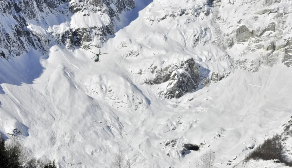 epa07342657 Recovery operations underway for the bodies of three free riders killed in an avalanche in Val Veny, identified as two British and a French, near the Alpine resort of Courmayeur, northwest Italy, 04 February 2019. The bodies of three people were found under an avalanche in the Canale degli Spagnoli, in Val Veny. Two British and two French skiers were reported missing on 03 February afternoon as high risk for avalanches was reported in the area. Searchers were said to be looking for the missing fourth skier. EPA/THIERRY PRONESTI