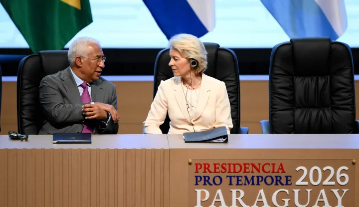 The President of the European Council Antonio Costa (L) and the President of the European Commission Ursula von der Leyen, talk during the signing ceremony of the trade agreement between the European Union and Mercosur, at the Gran Teatro Jose Asuncion Flores of Paraguay's Central Bank in Asuncion on January 17, 2026. The South American bloc Mercosur and the European Union signed a deal on January 17, 25 years in the making, to create one of the world's biggest free trade areas at a time of growing protectionism and volatility. (Photo by Luis ROBAYO/AFP)