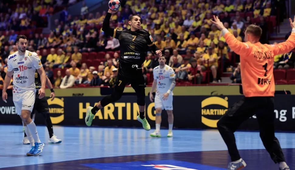 Georgia's wing #07 Khazein Rustamov shoots the ball during the EHF Euro 2026 group E preliminary round handball match between Croatia and Georgia in Malmo, Sweden, on January 17, 2026. (Photo by Andreas Hillergren/TT/TT News Agency/AFP)/Sweden OUT
