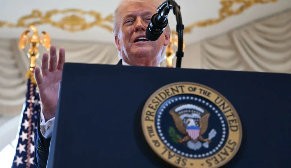 US President Donald Trump speaks during a dedication ceremony for Southern Boulevard, in the ballroom at Mar-a-Lago in Palm Beach, Florida, on January 16, 2026. Palm Beach Southern Boulevard, between Kirk Road and South Ocean Boulevard, is being renamed as "President Donald J. Trump Boulevard." (Photo by ANDREW CABALLERO-REYNOLDS/AFP)