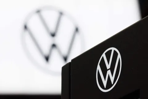 A photograph shows a logo of German automobile manufacturing company Volkswagen displayed during a press opening of the 102th edition of the Brussels Motor Show, at Brussels Expo, in Brussels on January 9, 2026. (Photo by BENOIT DOPPAGNE/Belga/AFP)/Belgium OUT
