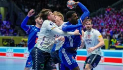 France's right back #10 Dika Mem vies for the ball during the EHF Euro 2026 group C preliminary round handball match between France and Norway in Oslo, Norway, on January 19, 2026. (Photo by Stian Lysberg Solum/NTB/AFP)/Norway OUT