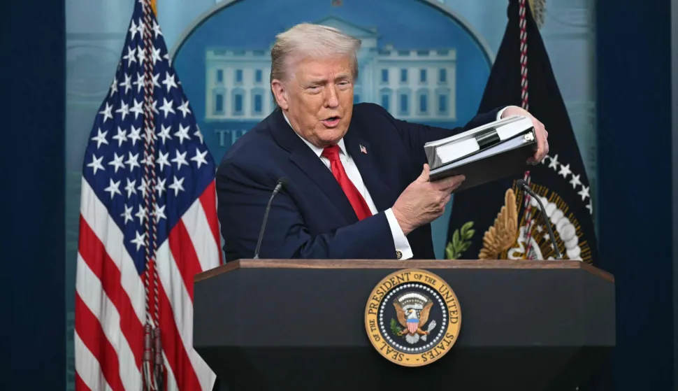 US President Donald Trump arrives during a briefing in the Brady Briefing Room of the White House in Washington, DC, on January 20, 2026. The White House said President Donald Trump will hold a press conference Tuesday exactly a year into his second term, amid acute international tension over his drive to take over Greenland. (Photo by SAUL LOEB/AFP)