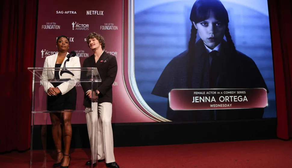 (L/R) US actress Janelle James and US actor Connor Storrie announce Jenna Ortega as a nominee for Best Female Actor in a Comedy Series during the 32nd Annual Actors Awards nominations announcement at the SAG-AFTRA Foundation's Tom Hanks & Rita Wilson theatre in Los Angeles on January 7, 2026. (Photo by VALERIE MACON/AFP)