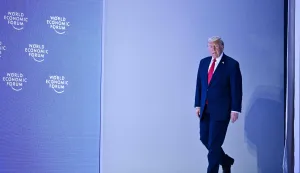 TOPSHOT - US President Donald Trump arrives to deliver a special address during the World Economic Forum (WEF) annual meeting in Davos on January 21, 2026. The World Economic Forum takes place in Davos from January 19 to January 23, 2026. (Photo by Mandel NGAN/AFP)