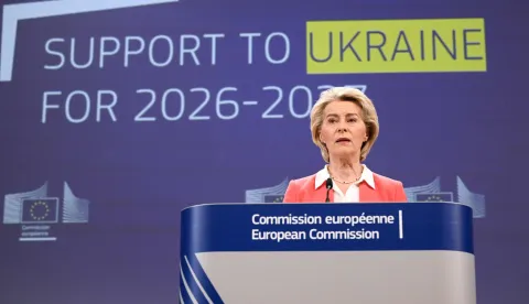 European Commission President Ursula von der Leyen speaks during a press conference to present a financial support package for Ukraine for 2026?2027 at the EU headquarters in Brussels on January 14, 2026. (Photo by Nicolas TUCAT/AFP)