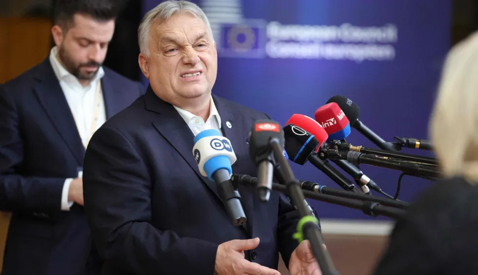 Hungary's Prime Minister Viktor Orban speaks to the press after an emergency meeting of the European Council over US President's Greenland threats, at the European headquarters in Brussels, on January 22, 2026. EU leaders meet on January 22, 2026, for an emergency summit on threats by US President to impose tariffs on countries opposed to his push to take Greenland, with crisis talks in Brussels coming to weigh potential countermeasures against the United States. (Photo by Ludovic MARIN/AFP)