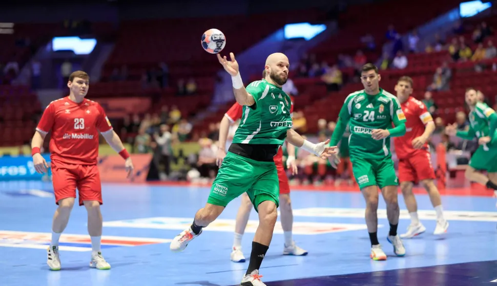 Hungary's pivot #02 Adrian Sipos shoots the ball during the men's EHF Euro 2026 main round handball match Switzerland v Hungary in Malmoe, Sweden, on January 23, 2026. (Photo by Andreas Hillergren/TT/TT NEWS AGENCY/AFP)/Sweden OUT
