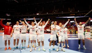 Croatia's team celebrates the victory over Iceland during the men's EHF Euro 2026 main round handball match Iceland v Croatia in Malmoe, Sweden, on January 23, 2026. (Photo by Andreas Hillergren/TT/various sources/AFP)/Sweden OUT