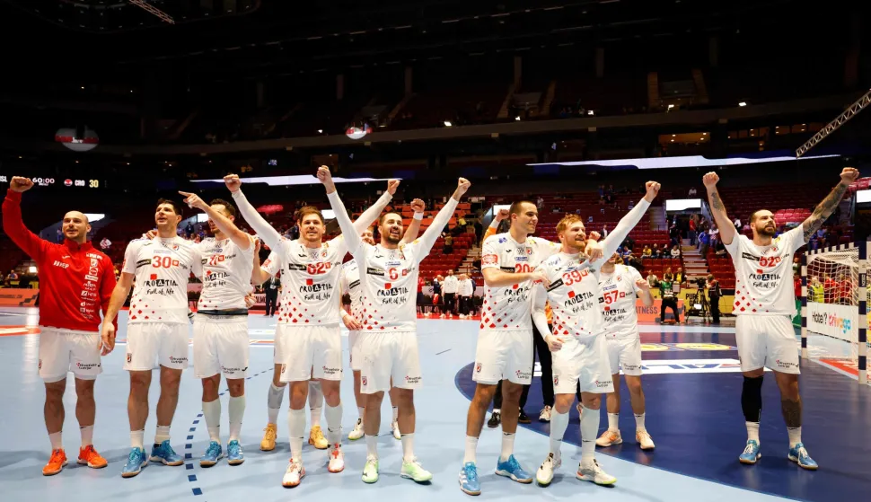 Croatia's team celebrates the victory over Iceland during the men's EHF Euro 2026 main round handball match Iceland v Croatia in Malmoe, Sweden, on January 23, 2026. (Photo by Andreas Hillergren/TT/various sources/AFP)/Sweden OUT