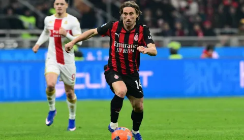 AC Milan's Croatian midfielder #14 Luka Modric controls the ball during the Italian Serie A football match between AC Milan and Genoa at San Siro stadium in Milan, northern Italy, on January 8, 2025. (Photo by Stefano RELLANDINI/AFP)