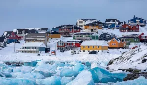 (FILES) Icebergs float in the water off Nuuk, Greenland, on March 7, 2025. US President Donald Trump is discussing options including military action to take control of Greenland, the White House said on January 6, 2026, upping tensions that Denmark warns could destroy the NATO alliance. Trump has stepped up his designs on the mineral-rich, self-governing Danish territory in the arctic since the US military seized Venezuelan leader Nicolas Maduro last weekend. (Photo by Odd ANDERSEN/AFP)