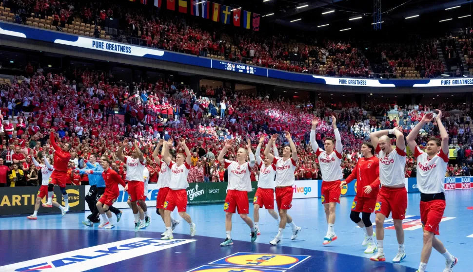 Denmark's players celebrate the victory with the fans during the men's EHF Euro 2026 main round handball match Germany vs Denmark in Herning, Denmark, on January 26, 2026. (Photo by Bo Amstrup/Ritzau Scanpix/AFP)/Denmark OUT