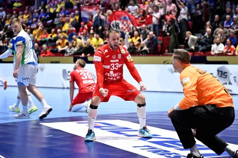 Croatia's centre back #33 Luka Cindric (C) celebrates a goal during the men's EHF Euro 2026 main round handball match Slovenia v Croatia in Malmoe, Sweden, on January 27, 2026. (Photo by Johan Nilsson/TT/TT NEWS AGENCY/AFP)/Sweden OUT