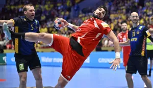 Hungary's pivot #45 Miklos Rosta scores during the men's EHF Euro 2026 main round handball match Sweden v Hungary in Malmoe, Sweden, on January 27, 2026. (Photo by Johan Nilsson/TT/TT NEWS AGENCY/AFP)/Sweden OUT
