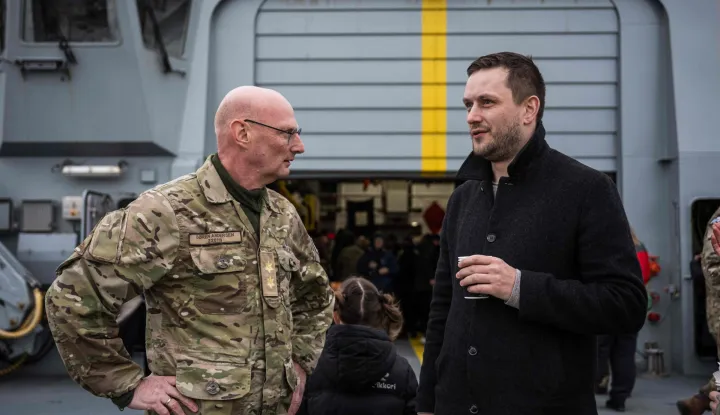 Greenland?s Prime Minister Jens-Frederik Nielsen (R) visits the Royal Danish Navy vessel HDMS Vaedderen during a public open day in Nuuk, Greenland, on January 24, 2026. HDMS (His Danish Majesty's Ship) Vaedderen (F359) is a Thetis-class ocean patrol vessel of the Royal Danish Navy. The vessel is employed to exercise Danish sovereignty in waters around the Faroe Islands and Greenland. (Photo by Jonathan NACKSTRAND/AFP)