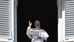 Pope Leo XIV delivers his speech from the window of the apostolic palace overlooking St. Peter's square during the Angelus prayer in the Vatican on January 25, 2026. (Photo by Andreas SOLARO/AFP)