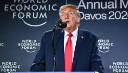 US President Donald Trump speaks during a reception with business leaders on the sidelines of the World Economic Forum (WEF) annual meeting in Davos on January 21, 2026. The World Economic Forum takes place in Davos from January 19 to January 23, 2026. (Photo by Mandel NGAN/AFP)