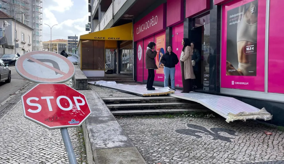 Debris and a broken street sign are pictured in a street of Leiria, central Portugal on January 28, 2026 after storm Kristin hit Portugal. Storm Kristin, which swept Portugal yesterday night and today, has left at least four dead in the Lisbon region and the center of the country, according to a new report from rescue services. (Photo by J?rome PIN/AFP)