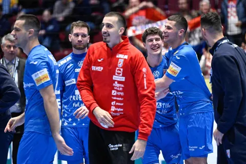 Croatia's team celebrates at the end of the men's EHF Euro 2026 main round handball match Croatia v Hungary in Malmoe, Sweden, on January 28, 2026. (Photo by Johan Nilsson/TT/TT NEWS AGENCY/AFP)/Sweden OUT