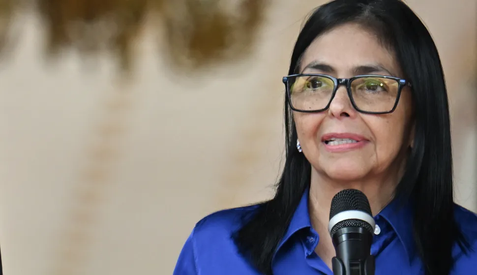 (FILES) Venezuela's interim President Delcy Rodriguez speaks during a press conference at the Miraflores Presidential Palace in Caracas on January 14, 2026. Venezuela's interim president Delcy Rodriguez forecast a $1.4 billion bonanza from planned reforms to the oil sector aimed at drawing in foreign investors following the ouster of Nicolas Maduro. During a meeting with business leaders attended by AFP on January 26, 2026, Rodriguez projected investments in the oil sector would rise 55 percent over 2025, when they totaled $900 million. (Photo by Juan BARRETO/AFP)