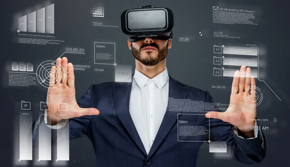 Male in a suit with virtual reality glasses on his head working in virtual financial world.posao gospodarstvo umjetna inteligencija UI AI tehnologija virtualna stvarnost ilustracija freepik