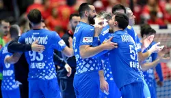 Croatia's players celebrate after their team won the bronze medal in the men's EHF Euro 2026 third place handball match Iceland vs Croatia in Herning, Denmark, on February 1, 2026. (Photo by Jonathan Nackstrand/AFP)
