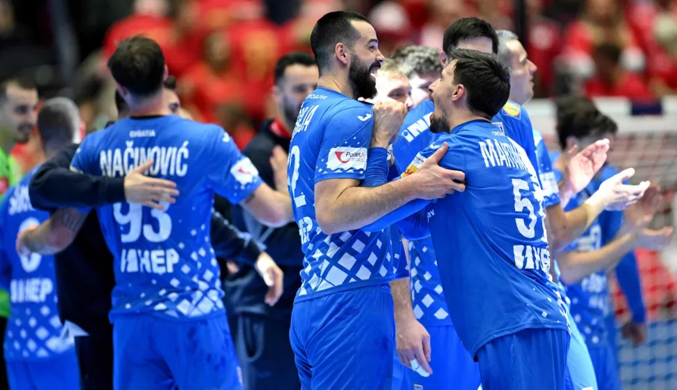 Croatia's players celebrate after their team won the bronze medal in the men's EHF Euro 2026 third place handball match Iceland vs Croatia in Herning, Denmark, on February 1, 2026. (Photo by Jonathan Nackstrand/AFP)