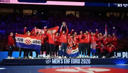 Croatia's players celebrate during the awarding ceremony after the team won bronze in the Men's EHF Euro 2026 finals in Herning, Denmark, on February 1, 2026. (Photo by Jonathan Nackstrand/AFP)