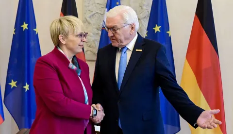 German President Frank-Walter Steinmeier and his Slovenian counterpart Natasa Pirc Musar shake hands afier signing the guest book and prior talks at the presidential Bellevue Palace in Berlin, on February 2, 2026. (Photo by John MACDOUGALL/AFP)