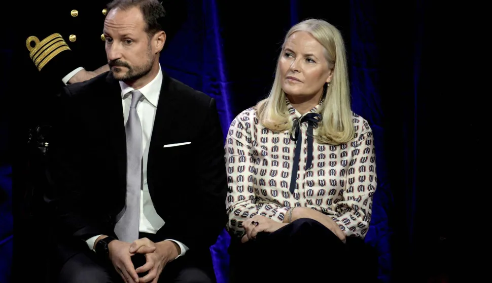 (FILES) Norway's Crown Prince Haakon and Crown Princess Mette-Marit attend the Save the Children peace prize party at the Nobel Peace Center ahead of the Nobel Peace Prize award ceremony at the Oslo City Hall in Oslo, Norway on December 10, 2024. Norwegian Crown Princess Mette-Marit's life was once the stuff of fairytales, but rape charges against her son and her recently revealed friendship with convicted US sex offender Jeffrey Epstein have seen it rapidly turn into a nightmare. The tale of the single mother from humble beginnings, whose chance encounter with Crown Prince Haakon propelled her to the heart of the monarchy, won the affection of Norwegians. But her frequent exchanges with Epstein, published this weekend in Norwegian media, have exposed an unsuspected relationship that has shocked the Scandinavian country. (Photo by Stian Lysberg Solum/NTB/AFP)/Norway OUT