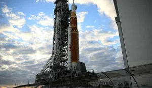 NASA's Artemis II Space Launch System rocket and Orion spacecraft are rolled out of the Vehicle Assembly Building to Launch Pad 39B at Kennedy Space Center in Florida on January 17, 2026, ahead of the crewed lunar mission. (Photo by Jim WATSON/AFP)