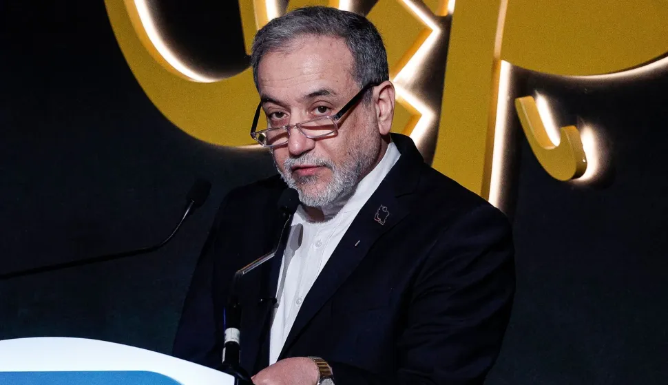 TOPSHOT - Iran?s Foreign Minister Abbas Araghchi looks on as he speaks during the 17th edition of the Al-Jazeera Forum in Doha on February 7, 2026. (Photo by Karim JAAFAR/AFP)