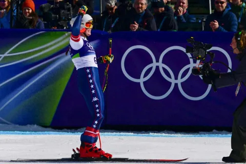 US' Breezy Johnson reacts in the finish area of the women's downhill event during the Milano Cortina 2026 Winter Olympic Games at the Tofane Alpine Skiing Centre in Cortina d?Ampezzo on February 8, 2026. (Photo by Stefano RELLANDINI/AFP)